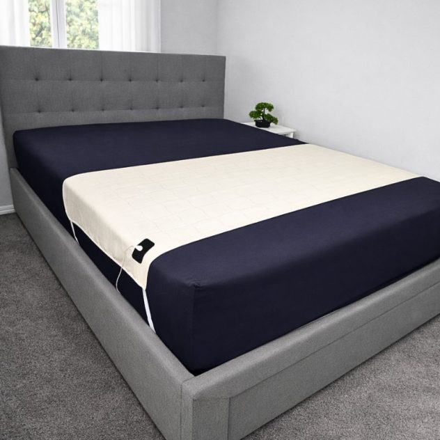 Grounding sheets Australia beige organic cotton 200 x 70cm with straps on mattress.