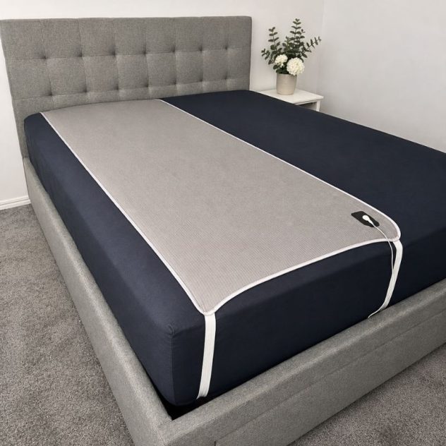 Grounding sheet neatly placed on mattress with secure fit