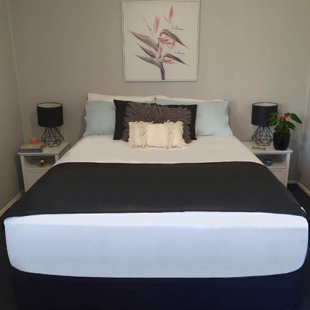 Grounding Mat Premium Single Size on queen bed.