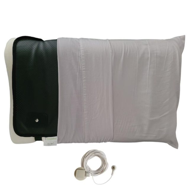 Premium grounding pillow cover with a standard pillowcase on top.