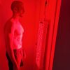 Red light therapy and infrared Proplus 1200 hanging on door.