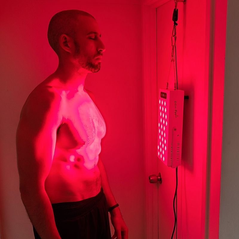 Red light therapy and infrared Proplus 300 hanging on door. Red light therapy and infrared Proplus 300 hanging on door.