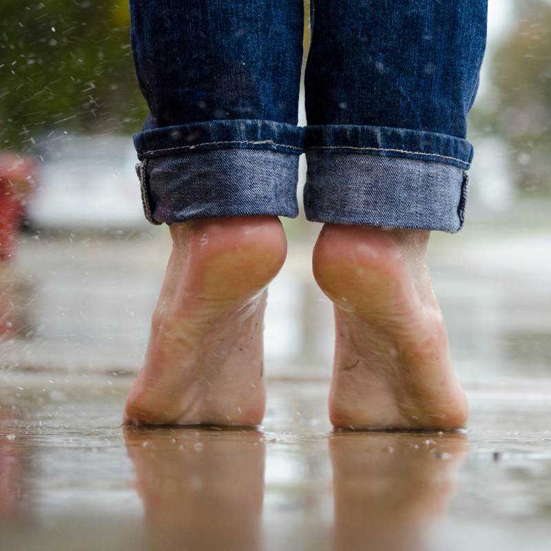 Feet on beach grounding.