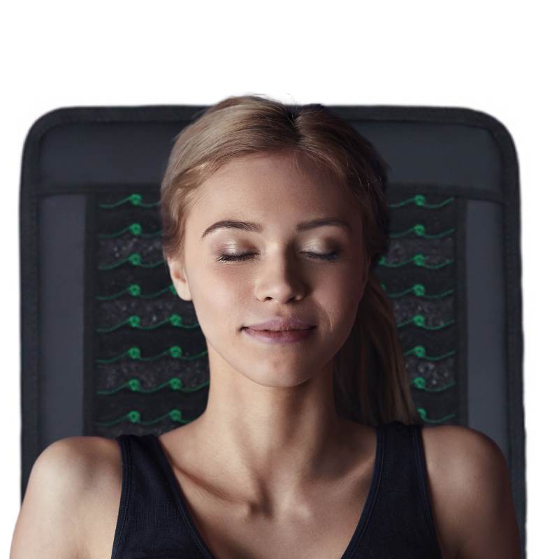 Close-up view of crystal layer featuring amethyst and tourmaline embedded in the mat. Close-up view of crystal layer featuring amethyst and tourmaline embedded in the mat.