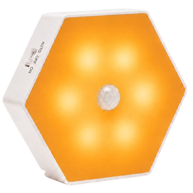 SleepGlow amber motion light product image with rechargeable hexagonal light and motion sensor.